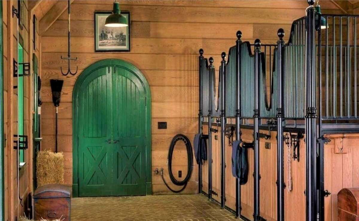 The stable at 0 N. Porchuck Road in Greenwich, Conn., is part of a property formerly owned by fashion designer Tommy Hilfiger, but is listed separately for nearly $7 million.