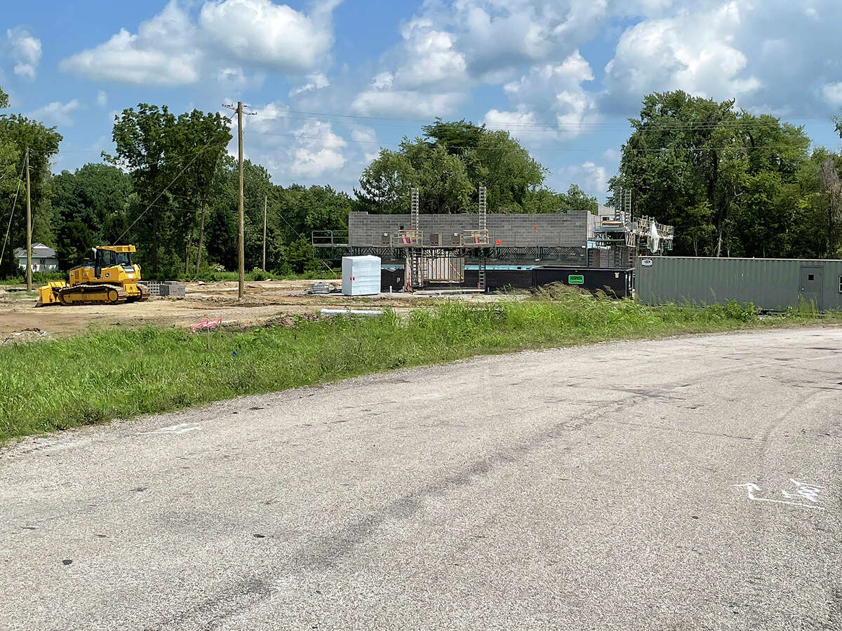 Work continues on the new Phillips 66 convenience store and gas station. Crews razed the old building, which dated to 1990, at the end of May. Weather permitting, they may have the building roofed by the end of the month. This image was shot Aug. 6.