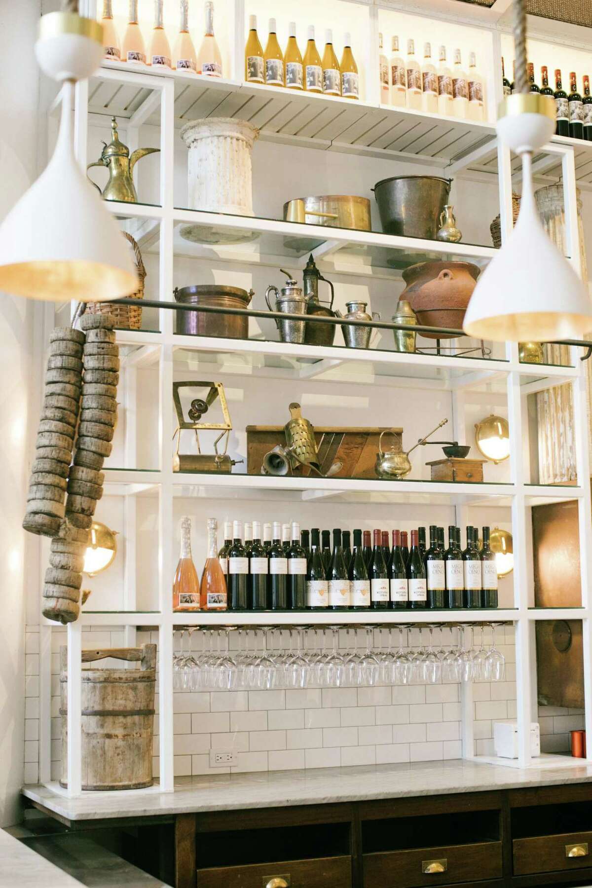 Objects that owner Charles Bililies brought back from Greece are on display behind the bar.