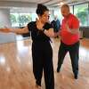 Dance instructor Amanda Meador teaches the rumba to Derby Mayor Rich Dziekan at the Fred Astaire Dance Studio in Shelton, Conn. on Wednesday, August 10, 2022. Dziekan and Meador will dance together in the Adam's House's Dancing with the Stars fundraiser in October.