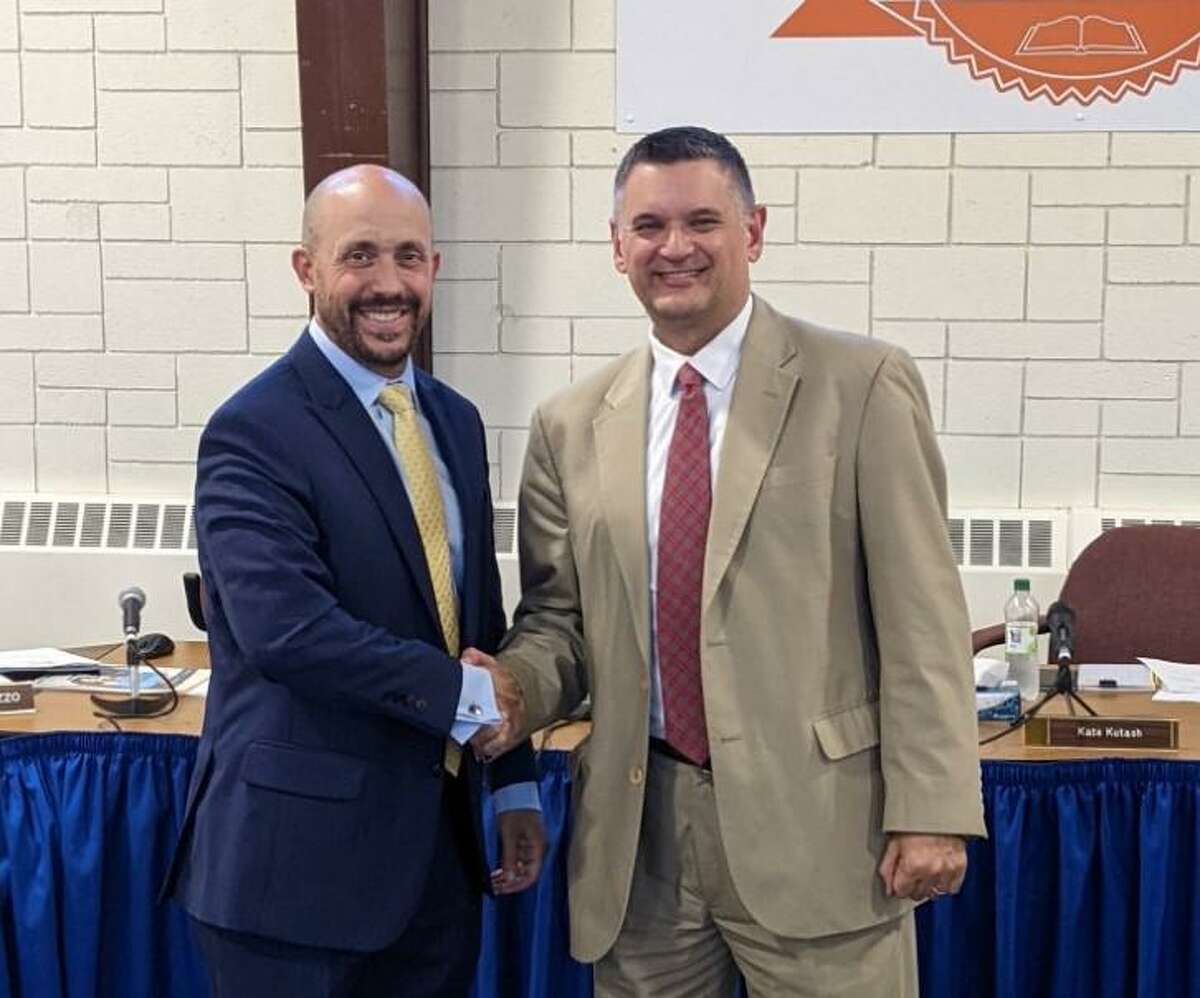 John Coppola, left, was named the new principal at Mohegan School in Shelton during the Board of Education meeting Aug. 10, 2022. Coppola is with Superintendent Ken Saranich.