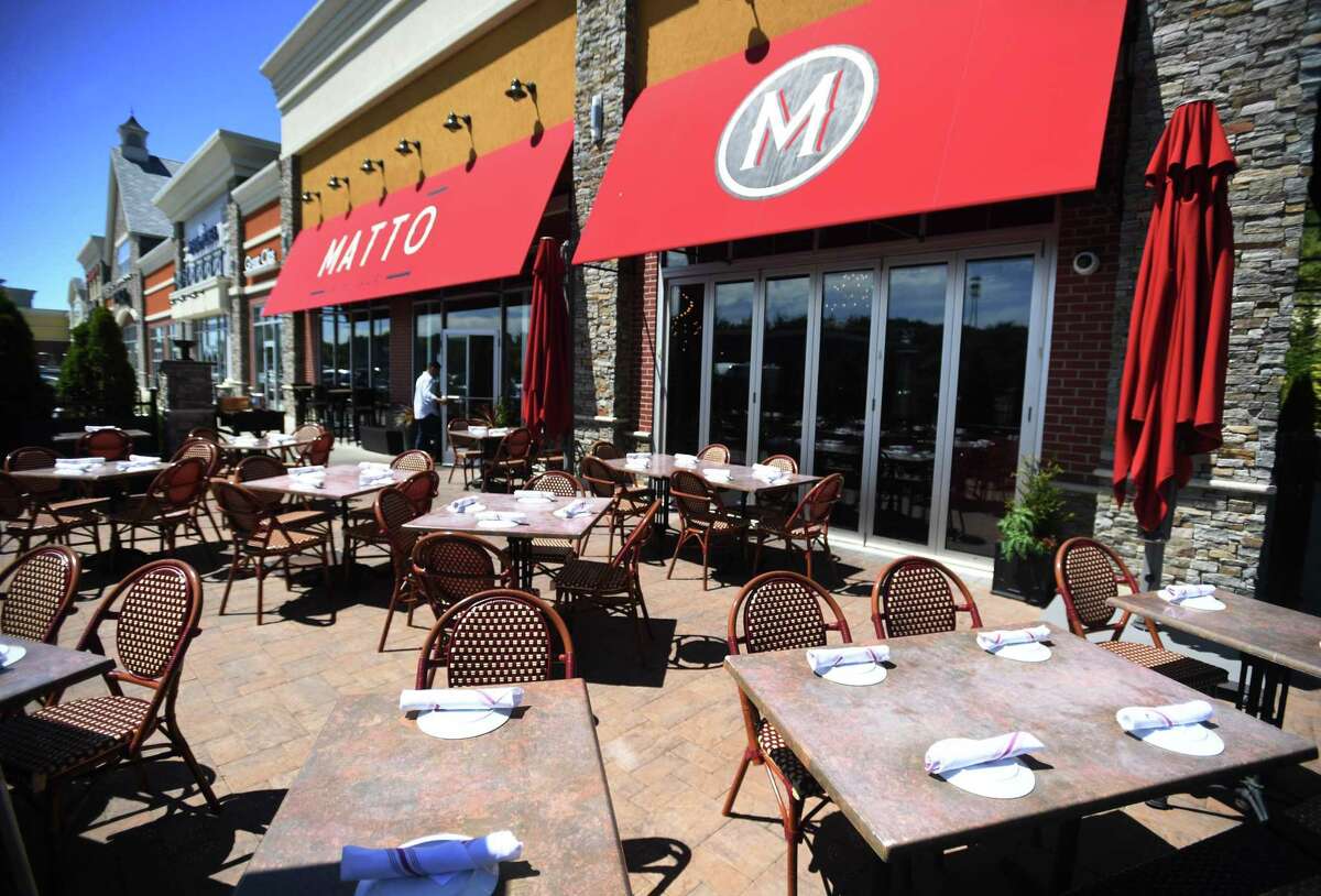 The outdoor dining area at Matto at 389 Bridgeport Avenue in Shelton, Conn. on Friday, August 12, 2022.