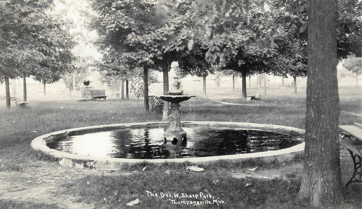 The decorative fountain in George W. Sharp park in Thompsonville, early 1900s. Part of the circular concrete foundation is still there today.