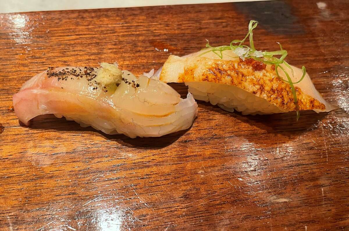This pair of nigiri costs $18 on the regular menu but "only" $10 on Uchi's happy hour menu.