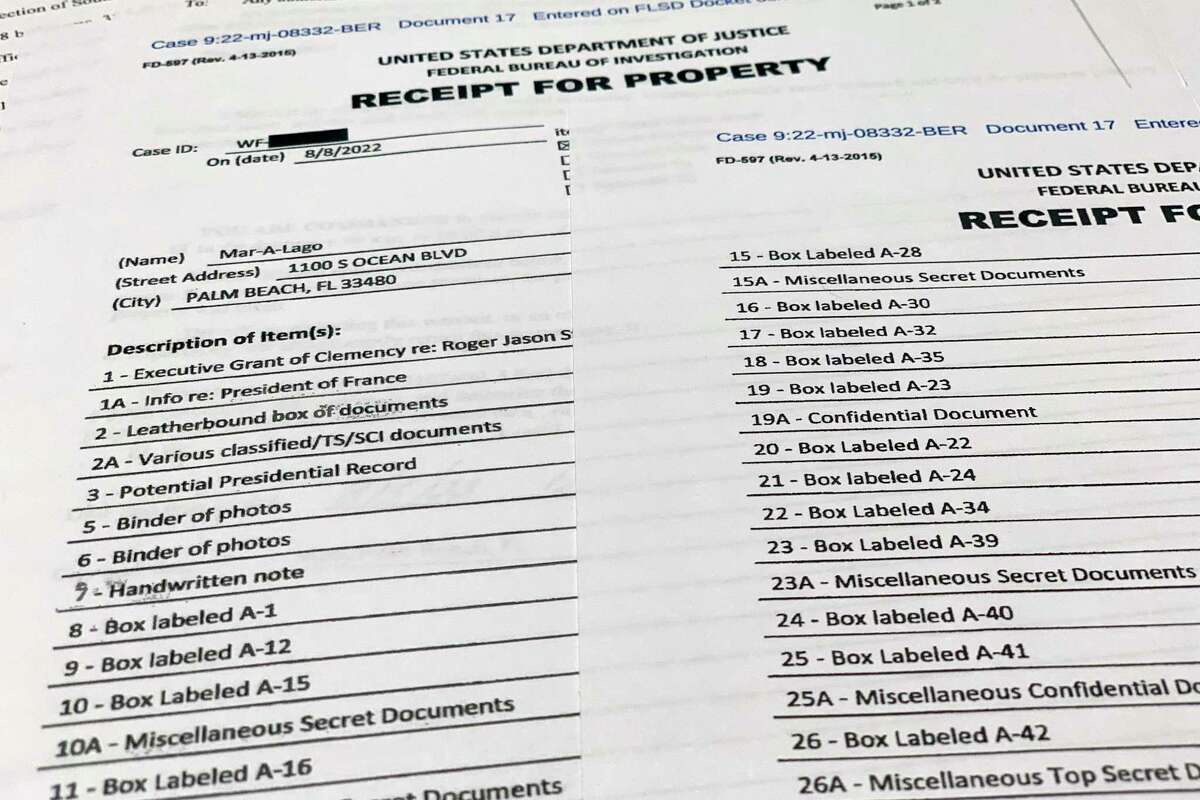 The receipt for property that was seized during the execution of a search warrant by the FBI at former President Donald Trump's Mar-a-Lago estate in Palm Beach, Fla., is photographed Friday, Aug. 12, 2022.