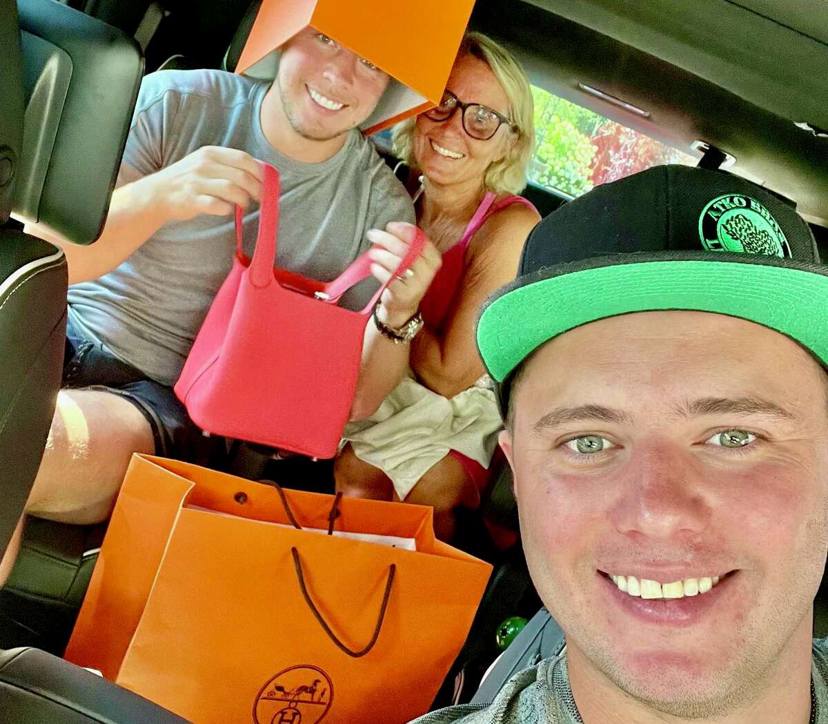 NFL Philadelphia Flyer Cam Atkinson, a Greenwich native, with his mom, Ellen Atkinson, and brother, Brett Atkinson, after shopping at Hermès on Greenwich Avenue last week.
