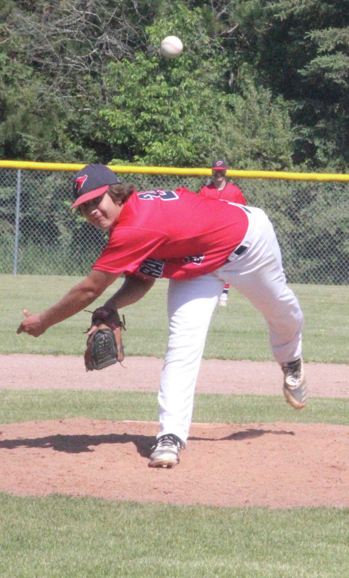 Sawyer Meeuwes fires a pitch during the 2021 Big Rapids High School season.