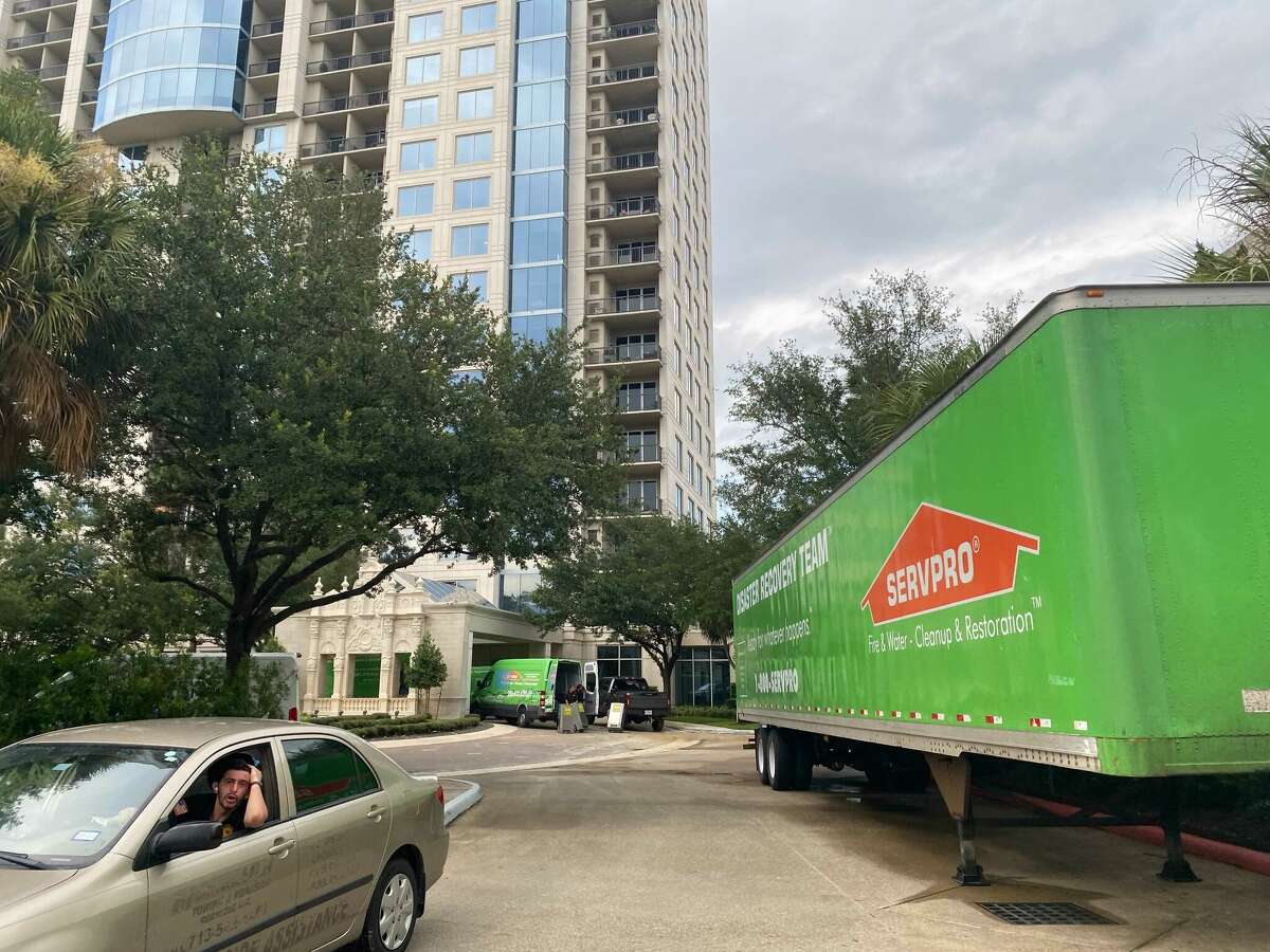 Servpro water remediators were onhand working to clear water Friday afternoon at The Royalton at River Oaks on Allen Parkway.
