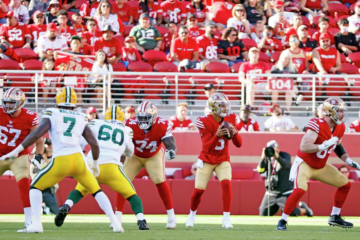 San Francisco 49ers quarterback Trey Lance (5) looks to pass in the first quarter of an NFL preseason game against the Green Bay Packers at Levi's Stadium, Friday, Aug. 12, 2022, in Santa Clara, Calif.