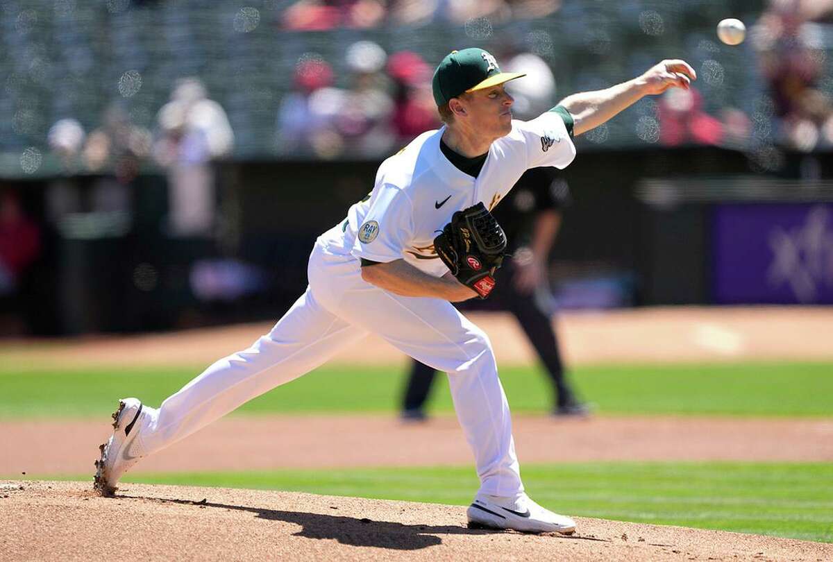 OAKLAND, CALIFORNIA - AUGUST 10: JP Sears #38 of the Oakland Athletics pitches against the Los Angeles Angels in the top of the first inning at RingCentral Coliseum on August 10, 2022 in Oakland, California. (Photo by Thearon W. Henderson/Getty Images)