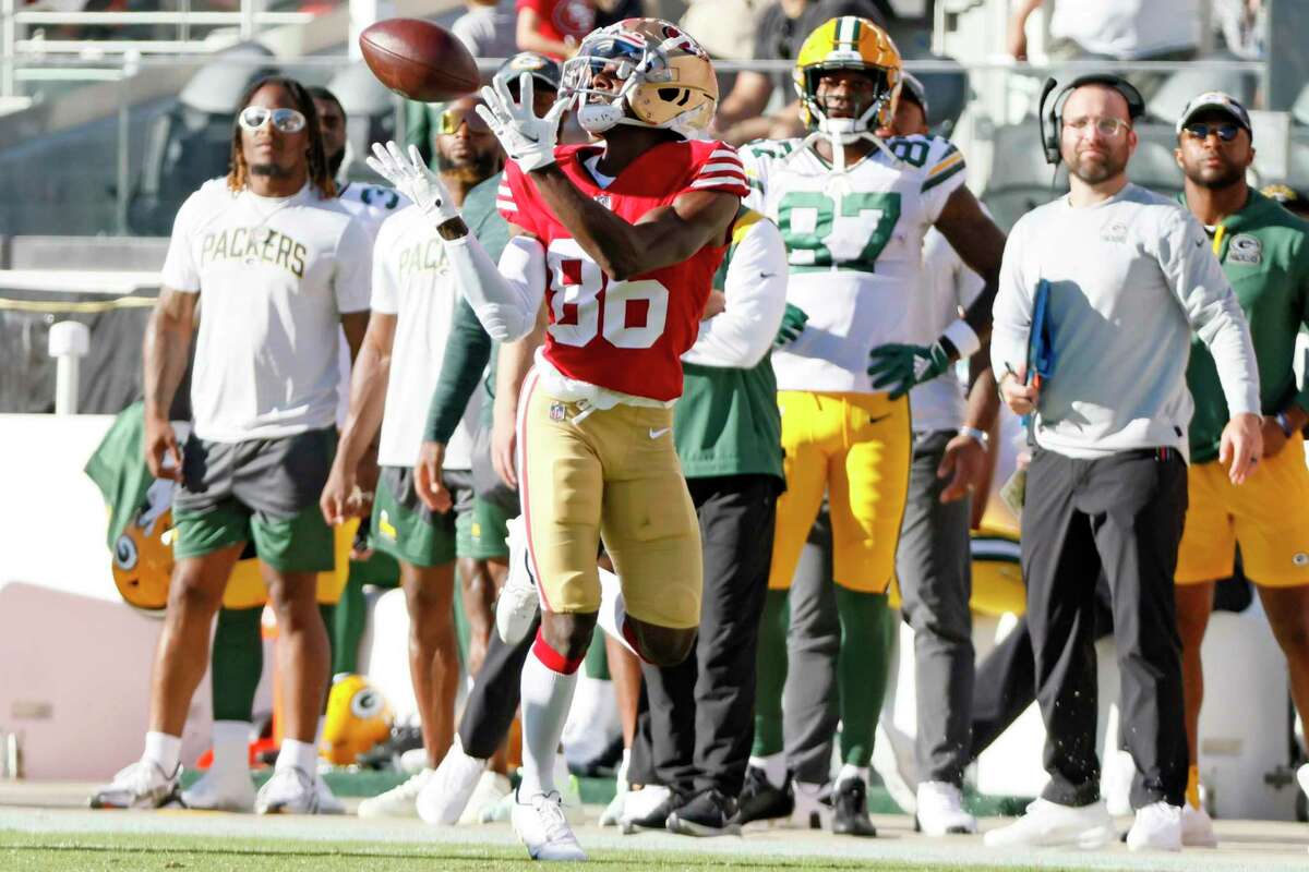 San Francisco 49ers wide receiver Danny Gray (86) makes the catch and runs into the end zone for a touchdown in the first quarter of an NFL preseason game against the Green Bay Packers at Levi's Stadium, Friday, Aug. 12, 2022, in Santa Clara, Calif.
