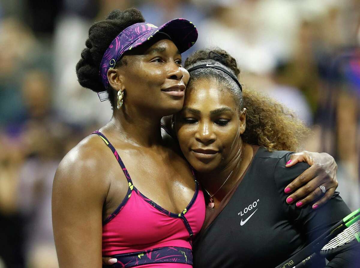 Serena Williams of The United States is congratulated by her sister and opponent Venus Williams at the USTA Billie Jean King National Tennis Center on Aug. 31, 2018 in New York.