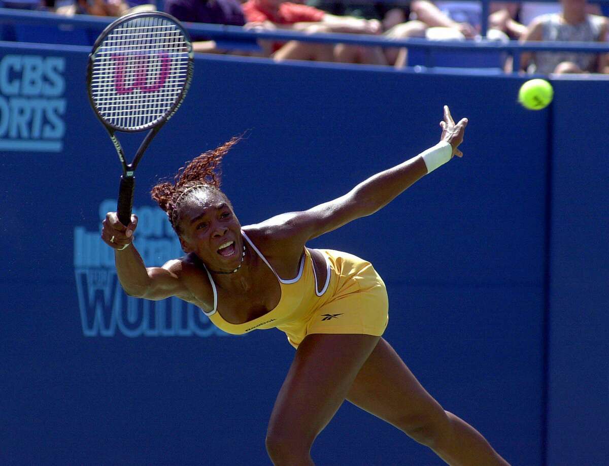 Venus Williams, of Palm Beach Gardens, Fla., returns a forehand shot to Monica Seles, of Sarasota, Fla., in their championship match at the Pilot Pen tennis tournament in New Haven, Conn., Saturday, Aug. 26, 2000.