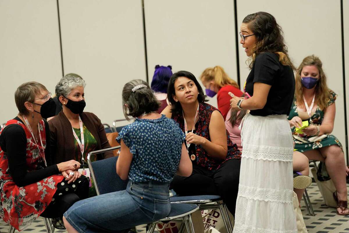 Mamas con Poder vice president Xochitl Oseguera, right, talks to a group of 2022 Women’s Convention attendees during a breakout session, Saturday, Aug. 13, 2022, in Houston.