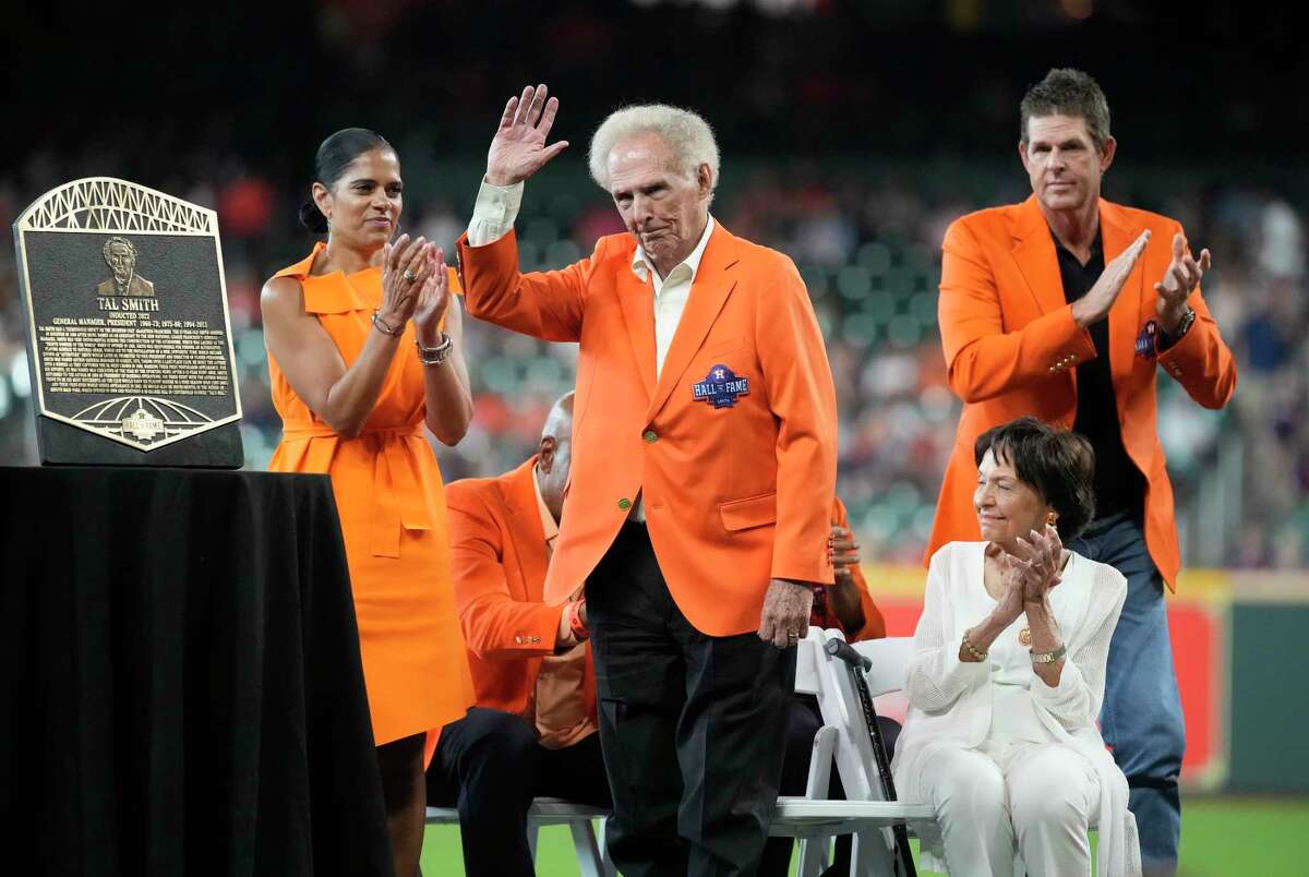 Houston Astros executive Tal Smith waves during the Astros Hall of Fame induction ceremony along with outfielder Terry Puhl before the start of an MLB game at Minute Maid Park on Saturday, Aug. 13, 2022 in Houston.