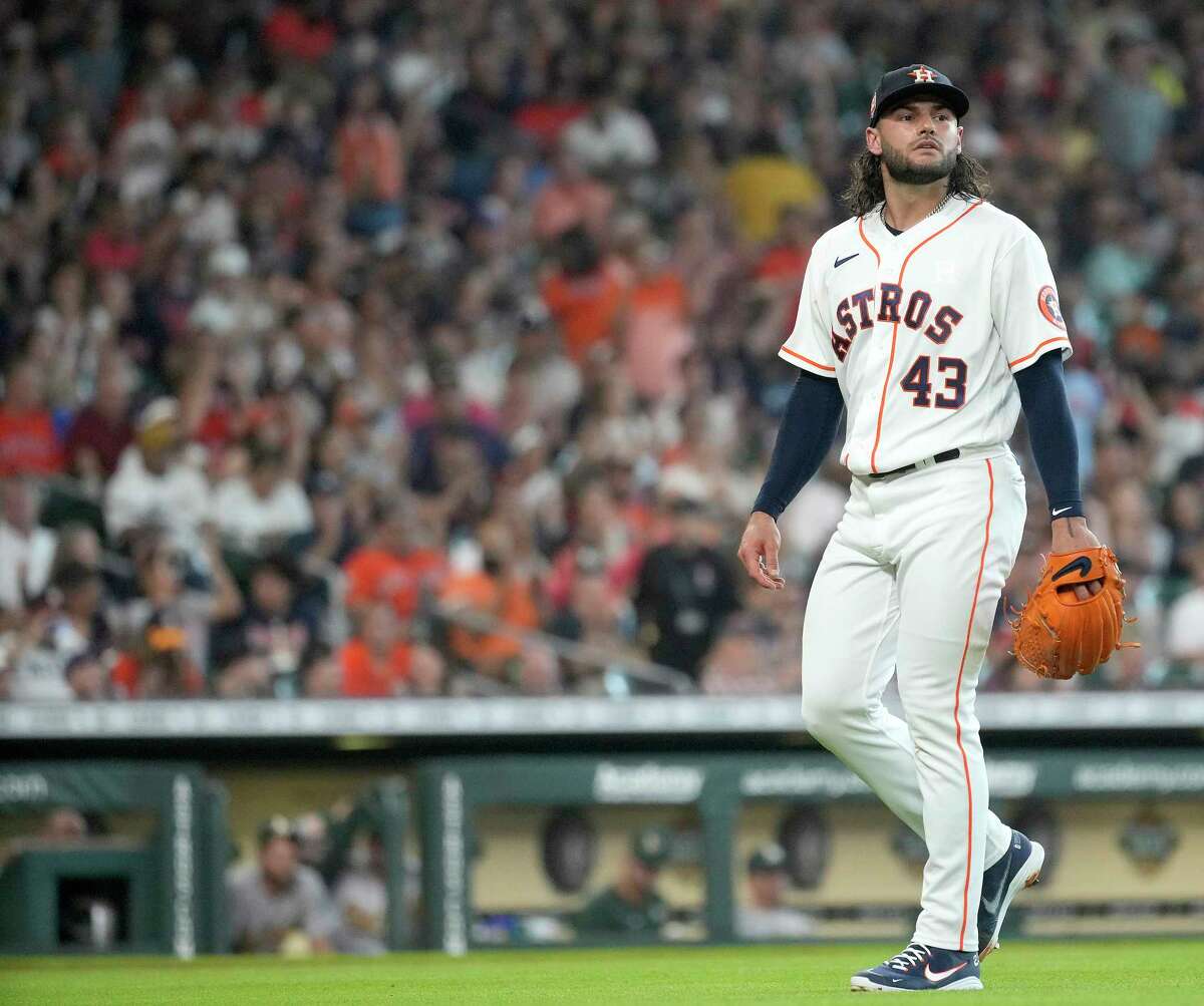 Houston Astros starting pitcher Lance McCullers Jr. (43) walks back to the dugout after Oakland Athletics Tony Kemp was called out on strikes and Cal Stevenson was caught stealing during the third inning of an MLB game at Minute Maid Park on Saturday, Aug. 13, 2022 in Houston.