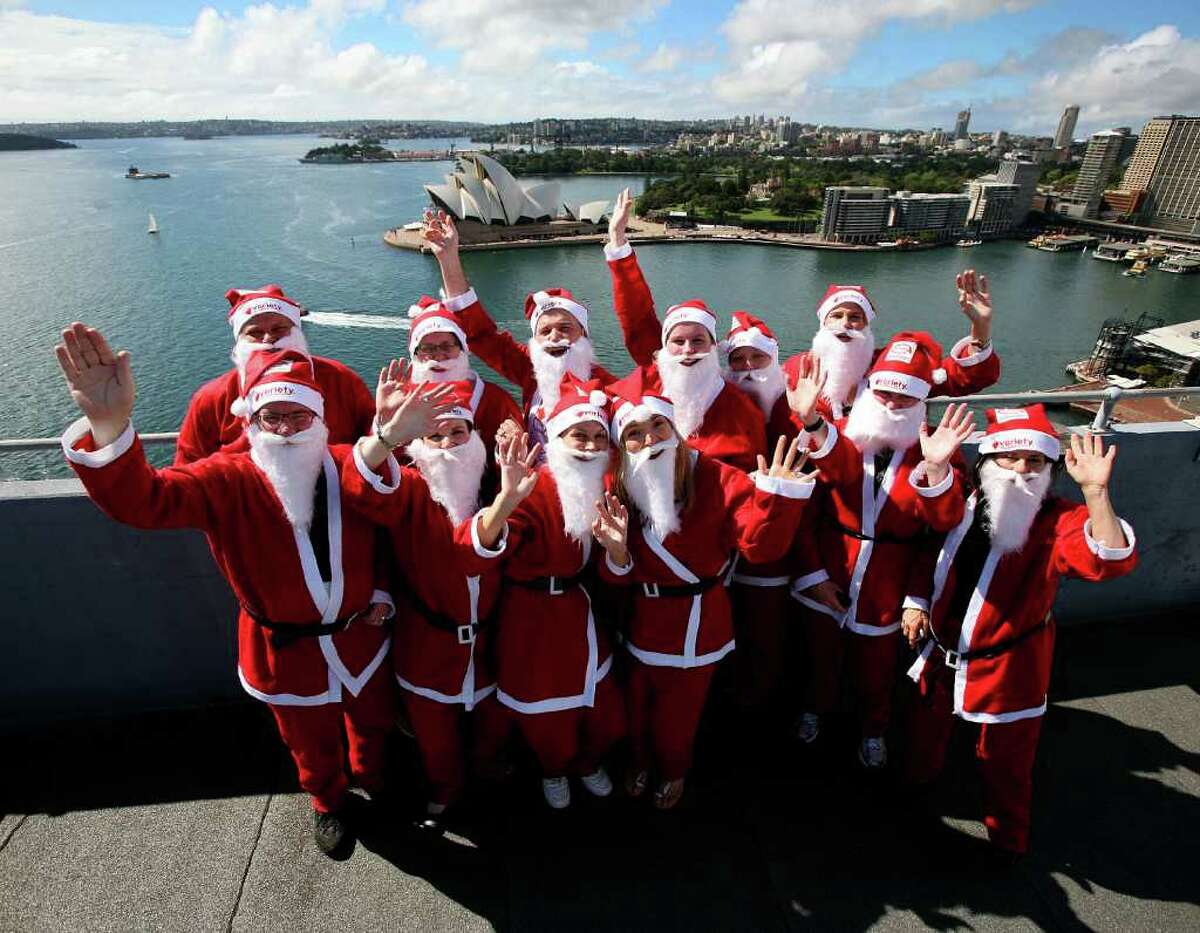 Santas Climb Sydney Harbour Bridge for Santa Fun Run