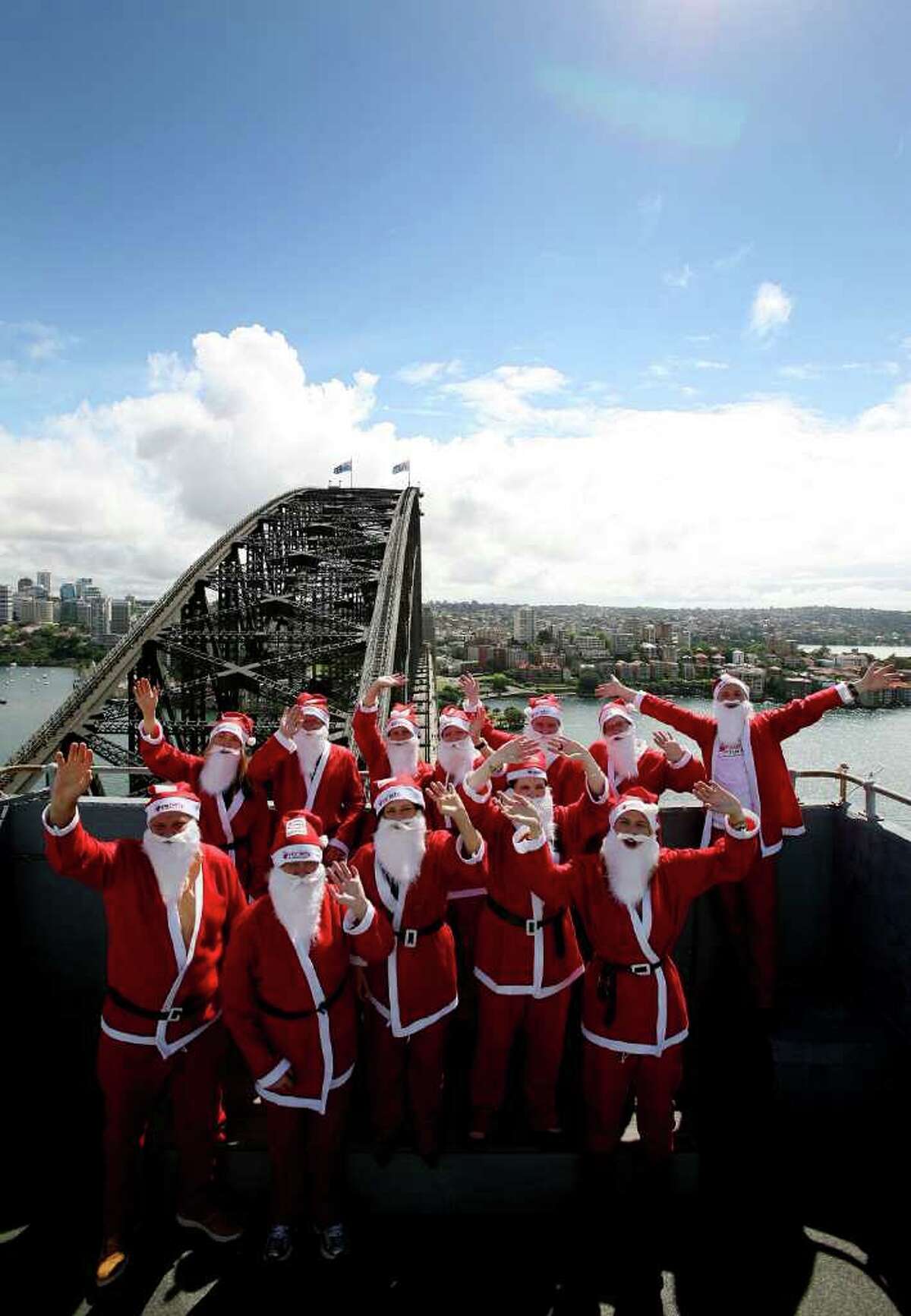 Santas Climb Sydney Harbour Bridge for Santa Fun Run