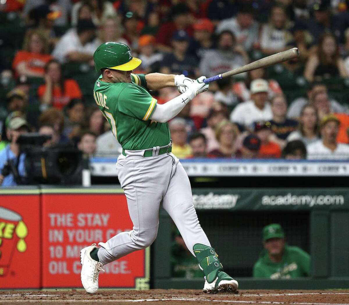 HOUSTON, TEXAS - AUGUST 12: Jonah Bride #77 of the Oakland Athletics doubles in a run in the second inning against the Houston Astros at Minute Maid Park on August 12, 2022 in Houston, Texas. (Photo by Bob Levey/Getty Images)