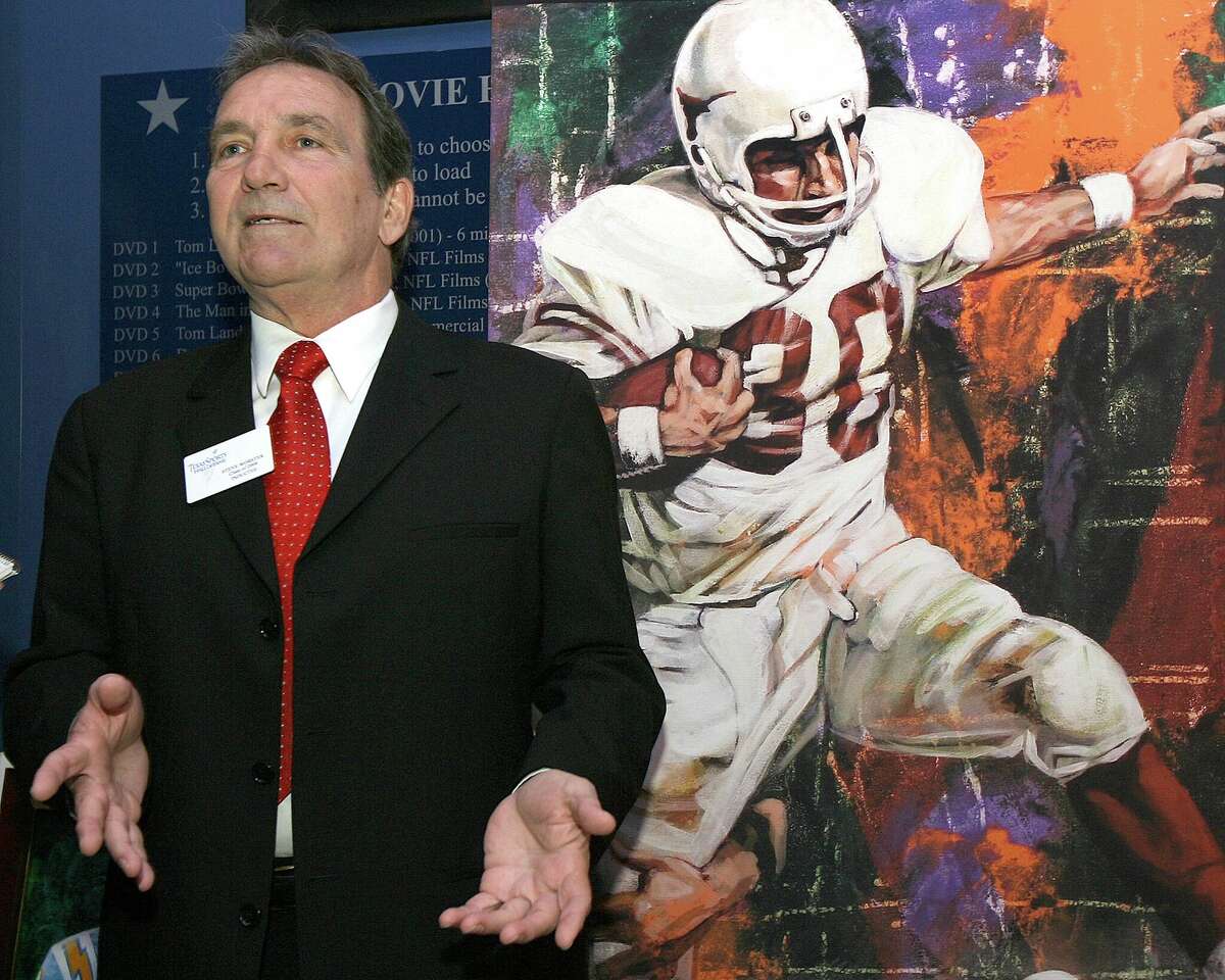 Former Texas fullback Steve Worster stands in front of a painting of him while talking with reporters during induction ceremonies at the Texas Sports Hall of Fame on Wednesday, March 4, 2009, in Waco, Texas. Worster passed away at age 73 on Saturday, Aug. 13.