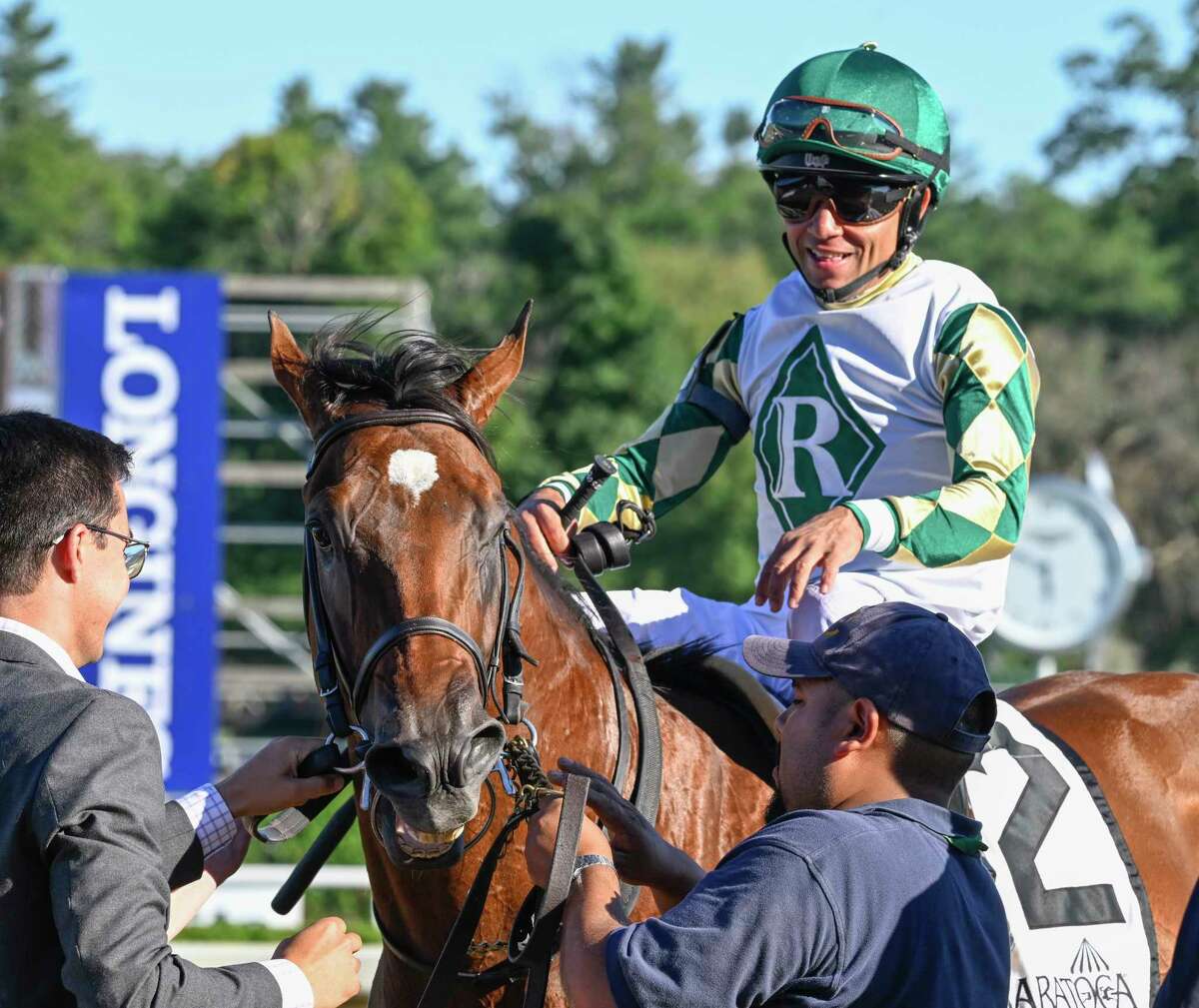 Jockey Joel Rosario is all smiles on Big Invasion after winning the 4th running of The Mahony at the Saratoga Race Course Sunday Aug. 14, 2022 in Saratoga Springs N.Y. Photo Special to the Times Union by Skip Dickstein