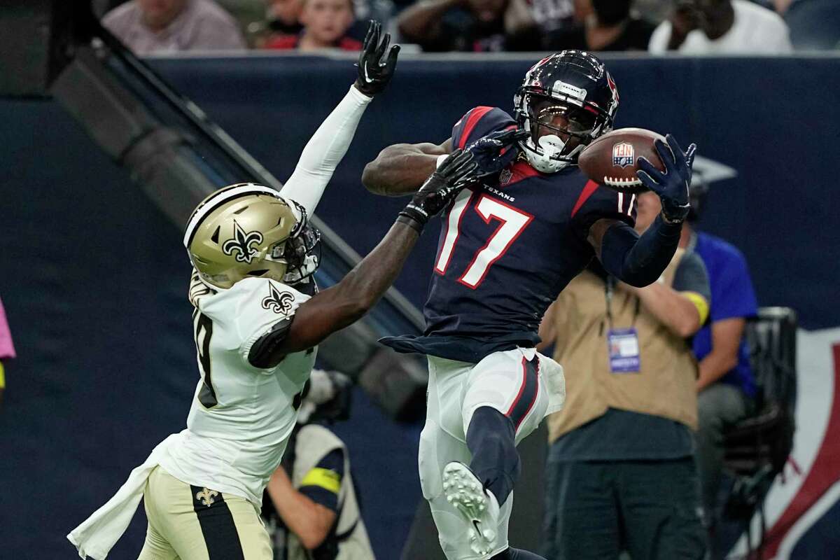 Denver Broncos tight end Julius Thomas (80) is tackled by Houston Texans  strong safety D.J. Swearinger (36) during the first half of an NFL  preseason football game, Saturday, Aug. 23, 2014, in