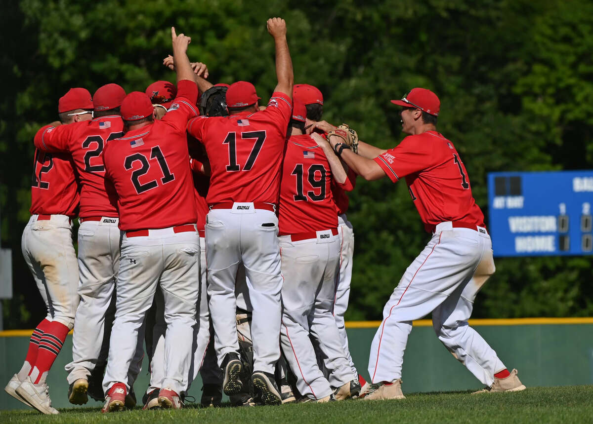 The Albany Athletics celebrate their series-clinching victory in the deciding game of the AABC Stan Musial Northeast World Series in Waterbury, Conn. Albany won twice on Sunday over the Terryville Black Sox to clinch the World Series, adding to titles it won in 2012 and 2016.