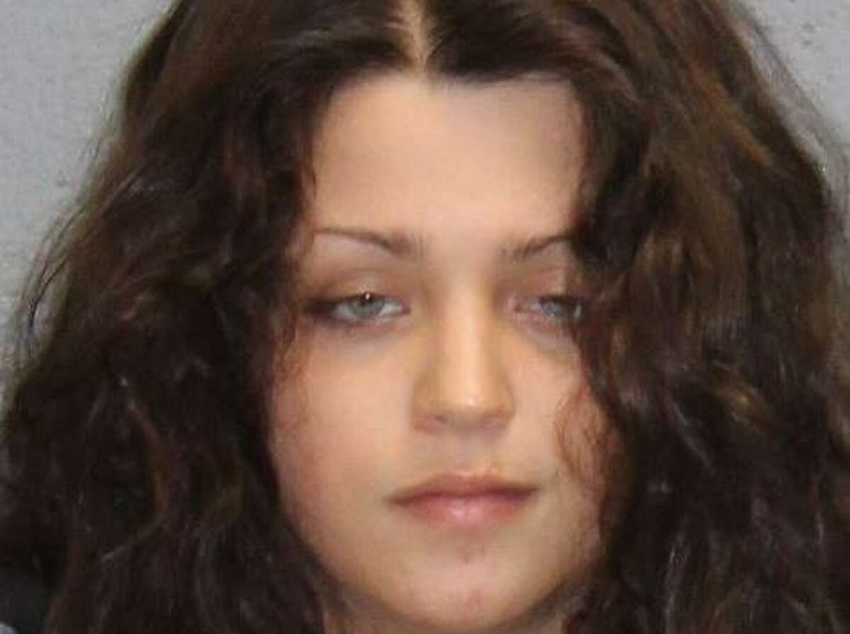 Ashley Schultz is accused of breaking into a Naugatuck home and biting a police officer, police say.