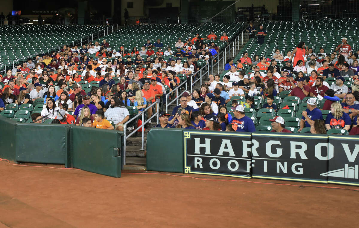 HOUSTON, TEXAS - AUGUST 14: Members of the community of Uvalde, TX, attend the game for Uvalde Strong Day as the Houston Astros host Uvalde Strong Day before the game against the Oakland Athletics at Minute Maid Park on August 14, 2022 in Houston, Texas. The Astros are busing in 500 members of the Uvalde community and have distributed 2,500 additional tickets. (Photo by Bob Levey/Getty Images)