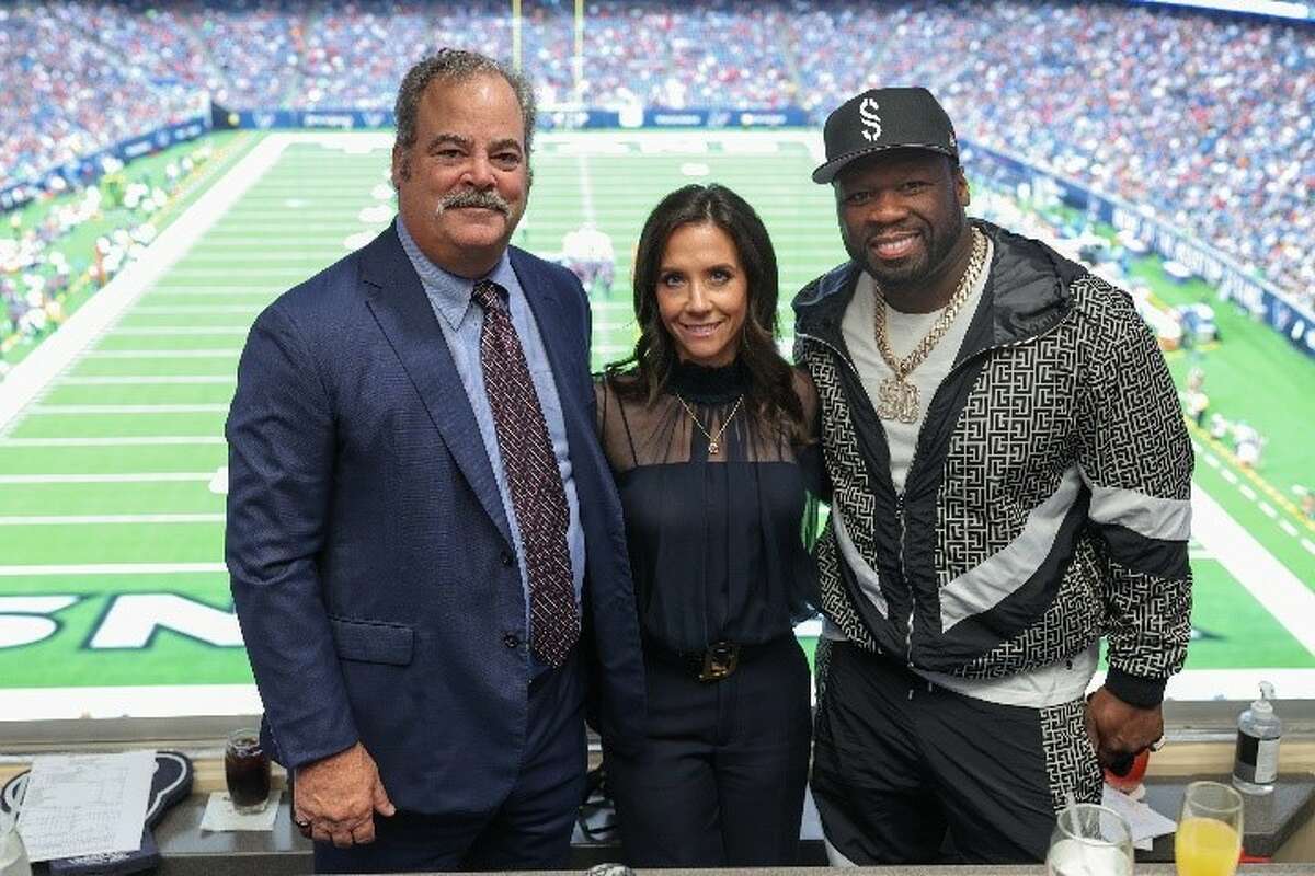 50 Cent in an NRG Stadium suite with Houston Texans CEO Cal McNair and wife Hannah McNair.