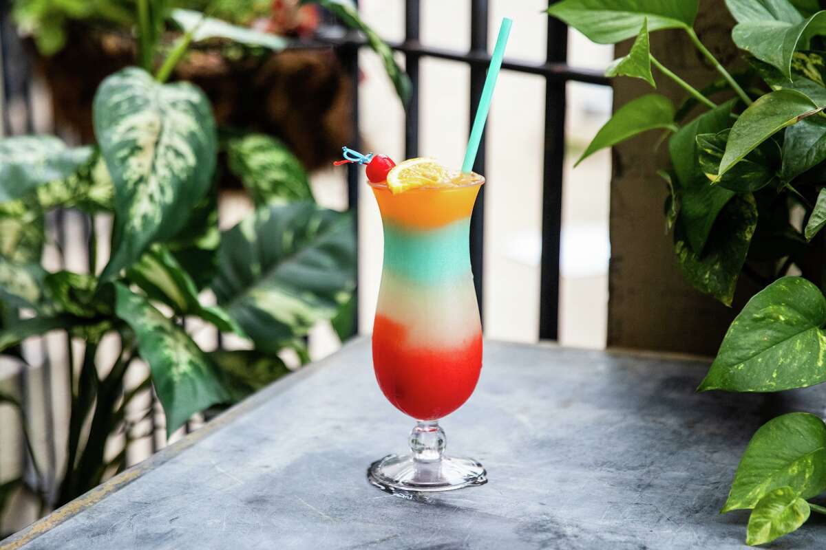 Four different frozen concoctions are layered into the Nola Bomb cocktail at Orleans Seafood Kitchen in Katy.