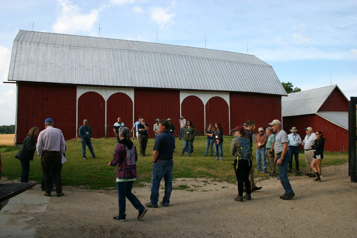 Participants visited the Cook Farm to learn about the Michigan Agricultural Environmental Assurance Program, during the annual Mecosta Conservation District bus tour.