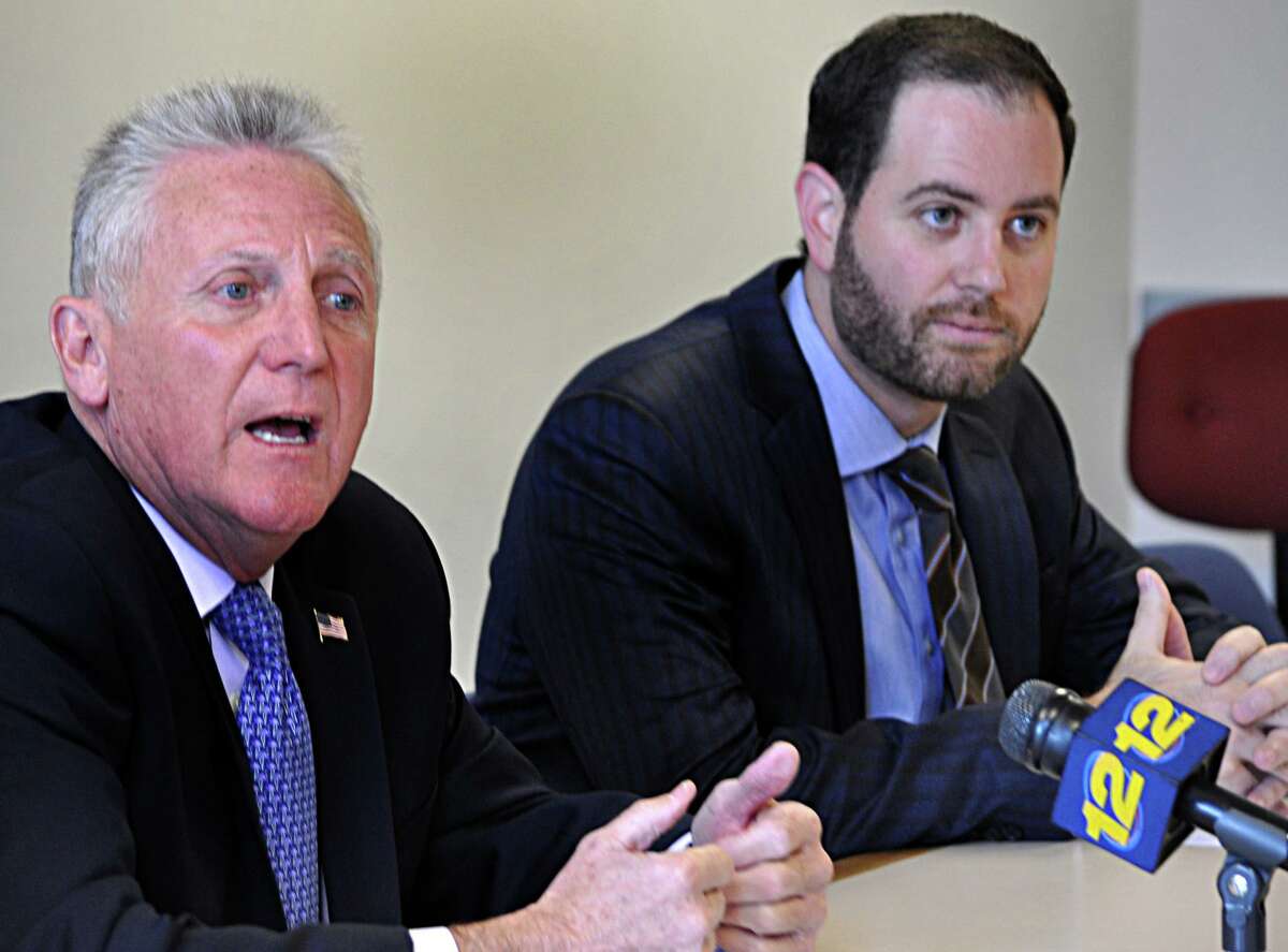 Then-mayor-elect Harry Rilling, left, announces at a press conference that Mario F. Coppola will be his corporation counsel.