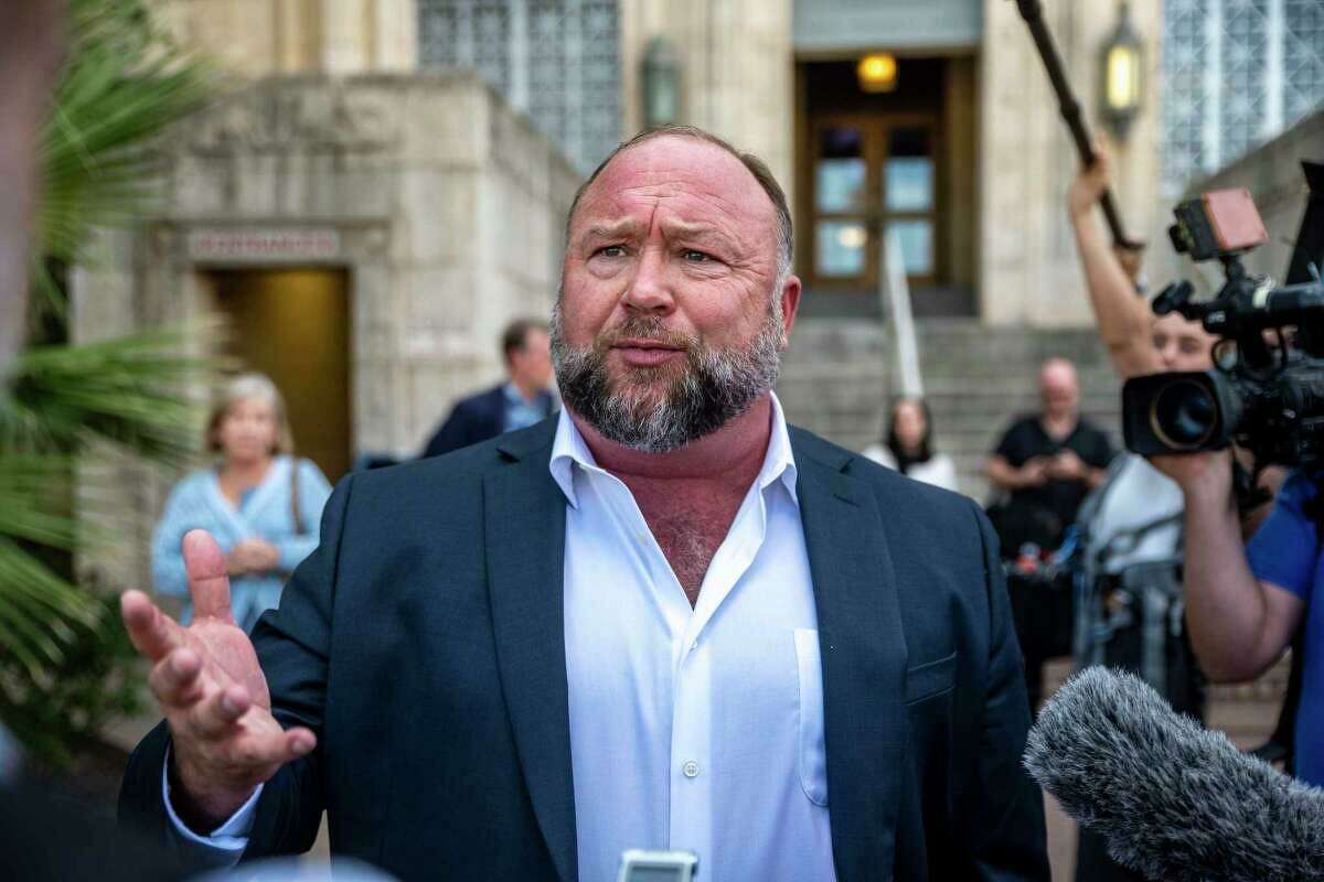 Alex Jones speaks to the media outside the 459th Civil District Court on Tuesday, Aug. 2, 2022 in Austin, TX. Neil Heslin and Scarlett Lewis were awarded $49 million in damages over Jones’ claims that the Sandy Hook massacre was a “hoax.” A second trial to determine how much Jones will pay eight Sandy Hook families he defamed is on track to begin in Connecticut as soon as this week.
