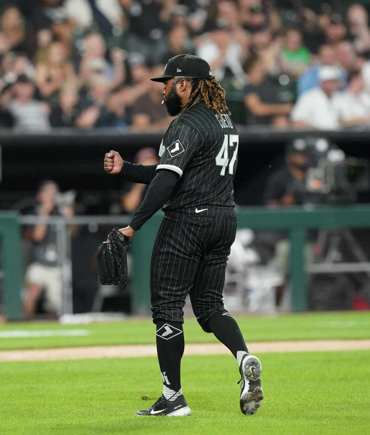 CHICAGO, ILLINOIS - AUGUST 15: Johnny Cueto #47 of the Chicago White Sox reacts after finishing the sixth inning against the Houston Astros at Guaranteed Rate Field on August 15, 2022 in Chicago, Illinois. (Photo by Nuccio DiNuzzo/Getty Images)