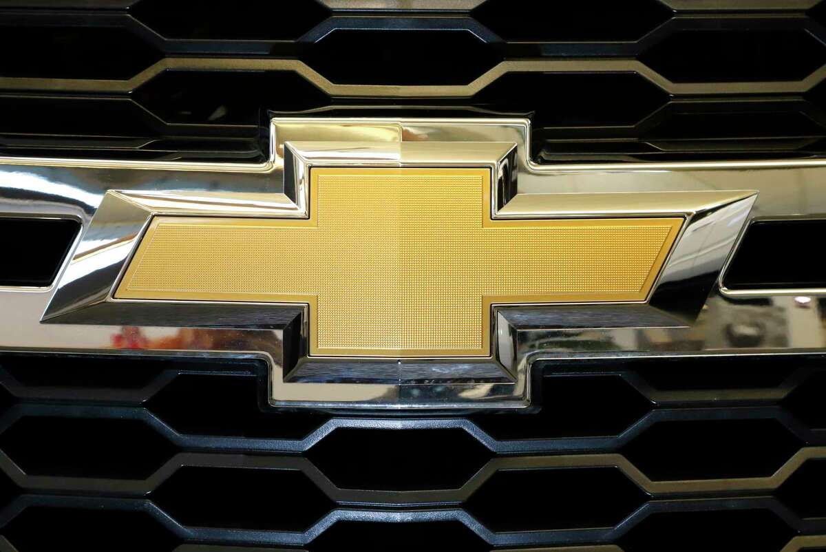 FILE - The Chevrolet logo is displayed at the 2020 Pittsburgh International Auto Show Thursday, Feb.13, 2020 in Pittsburgh. General Motors is recalling more than 484,000 large SUVs in the U.S., Tuesday, Aug. 16, 2022, to fix a problem that can cause the third-row seat belts to malfunction. The recall covers Chevrolet Suburbans and Tahoes, Cadillac Escalades and GMC Yukons from 2021 and 2022.