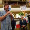 Actor Chuck Norris Monday afternoon speaks to a crowd gathered at Clear Springs Restaurant in Midland during a campaign stop for Republican gubernatorial candidate Greg Abbott.