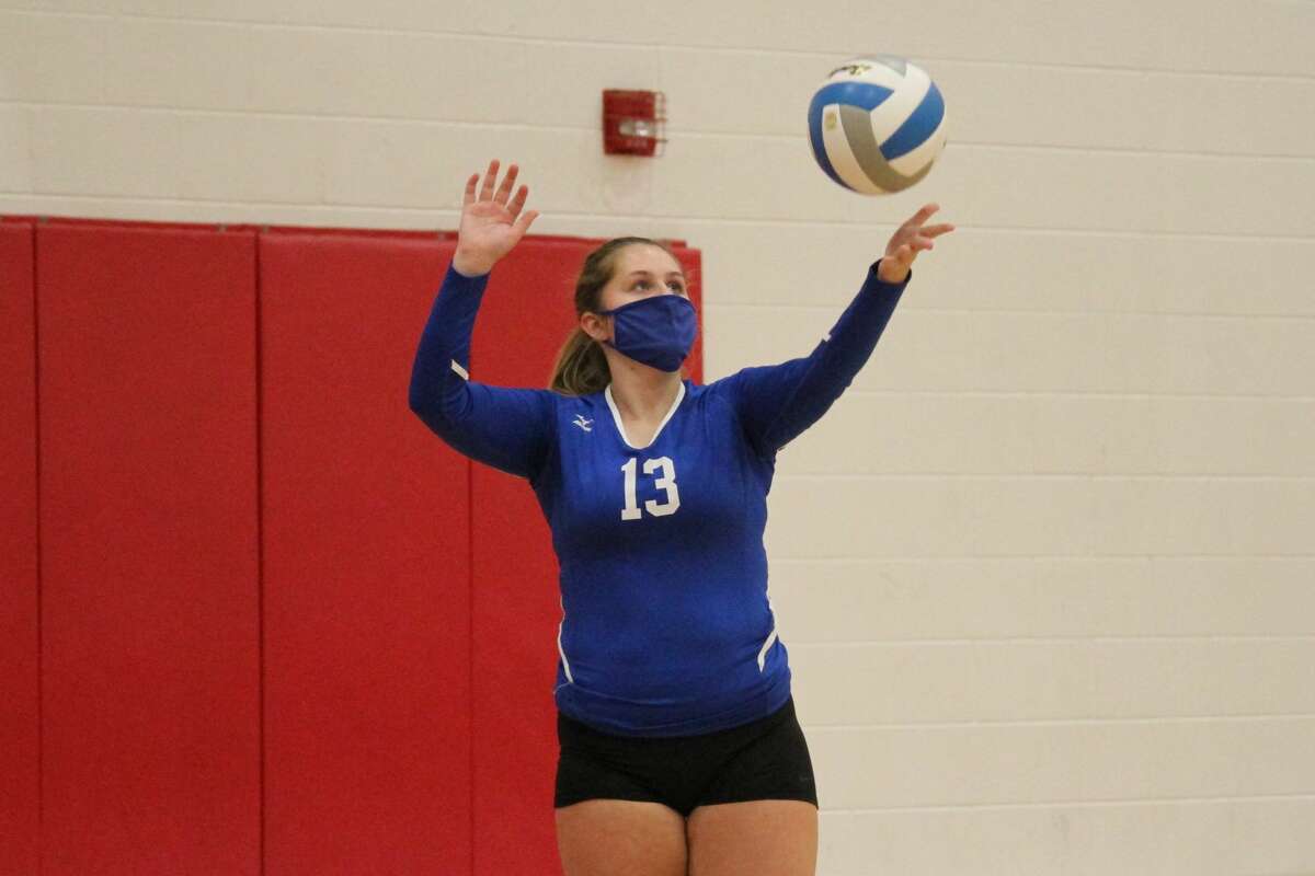 Onekama's Carly Bennett serves the ball during the 2021 season. 