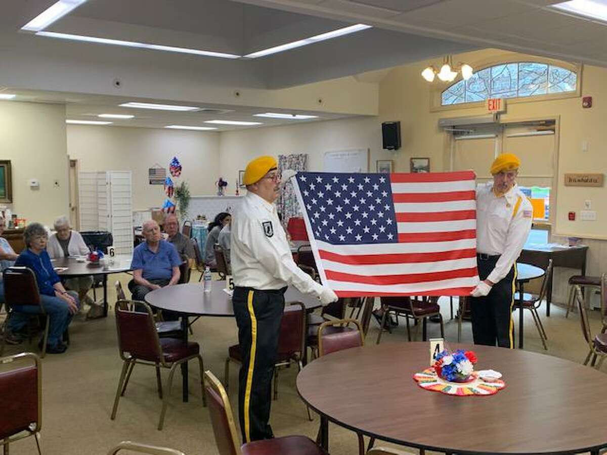 Riverton Grange #169 hosted its 15th monthly Veterans Salute at the Barkhamsted Senior Center Aug. 7. Members of the Riverton American Legion Post #159 Color Guard began the ceremony by folding a retired American flag.