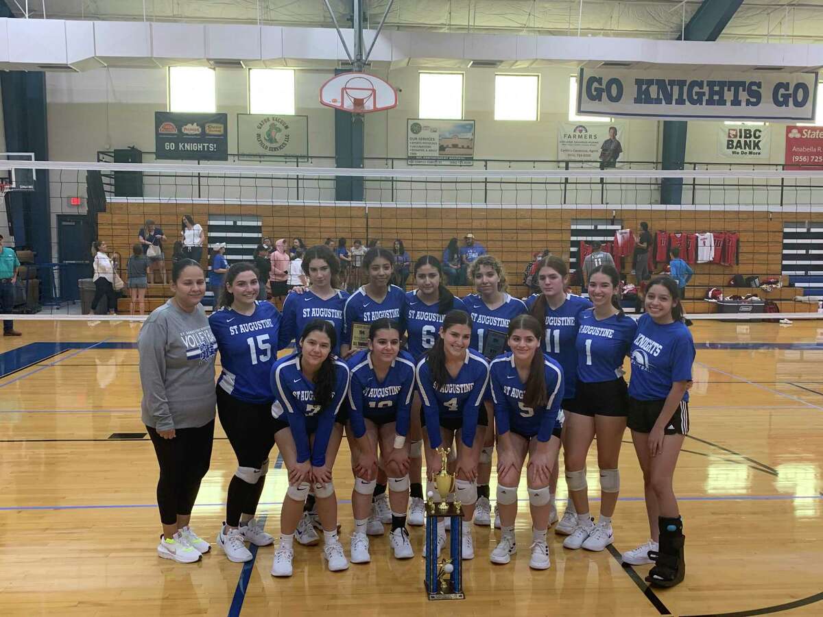 The St. Augustine Lady Knights pictured with the Dr. Marissa Keene Memorial Volleyball Tournament Trophy on August 13, 2022.