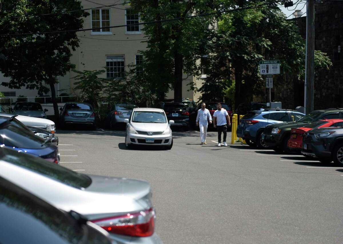 The Benedict South public parking lot is full as cars search for open spaces in Greenwich, Conn. Thursday, Aug. 4, 2022. Some local business owners are calling for a diagonal reconfiguring of the outdoor dining areas and adding new parking garages to alleviate traffic and parking woes along The Avenue.