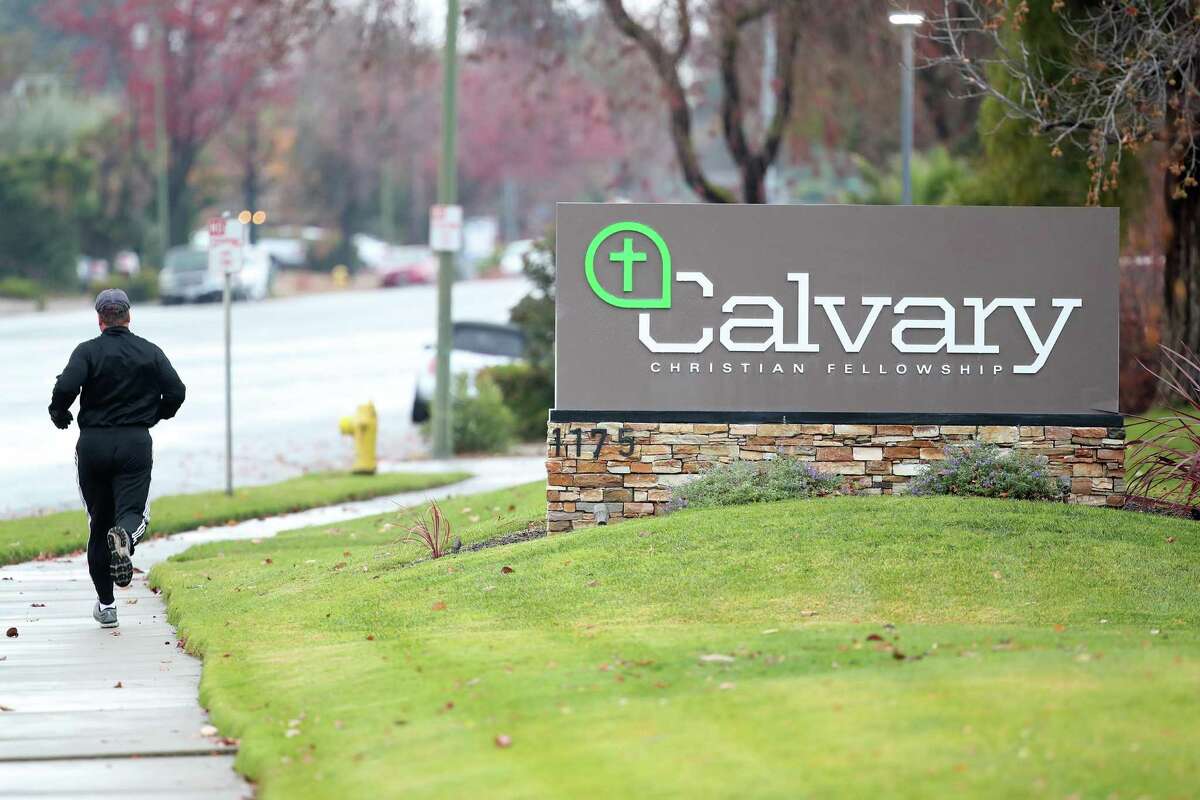 A “Calvary” sign marks the location of Calvary Chapel San Jose. A California appeals has overturned $190,000 in fines against the church and its pastors for defying state and county pandemic limits on indoor public gatherings.
