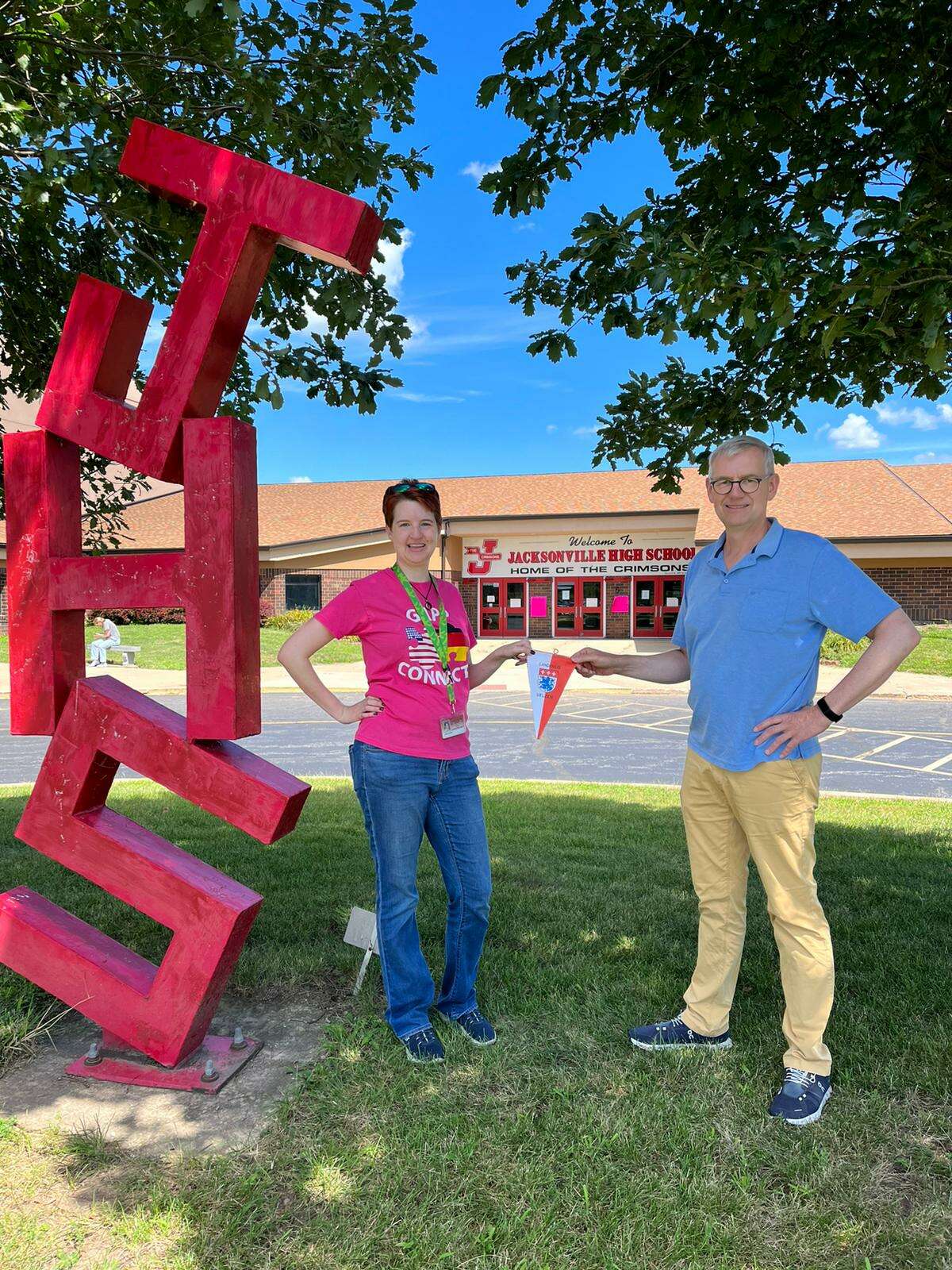 German teacher Lynette Guthrie (left) shows Heiko Blume around Jacksonville High School in July to showcase the German American Partnership Program. Blume, an elected official in Uelzen, Germany, wanted to visit JHS after his daughter participated in GAPP in 2019.