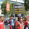 Kaiser workers strike at the Oakland Medical Center to protest the HMO's "unethical" working conditions on August 16, 2022.  