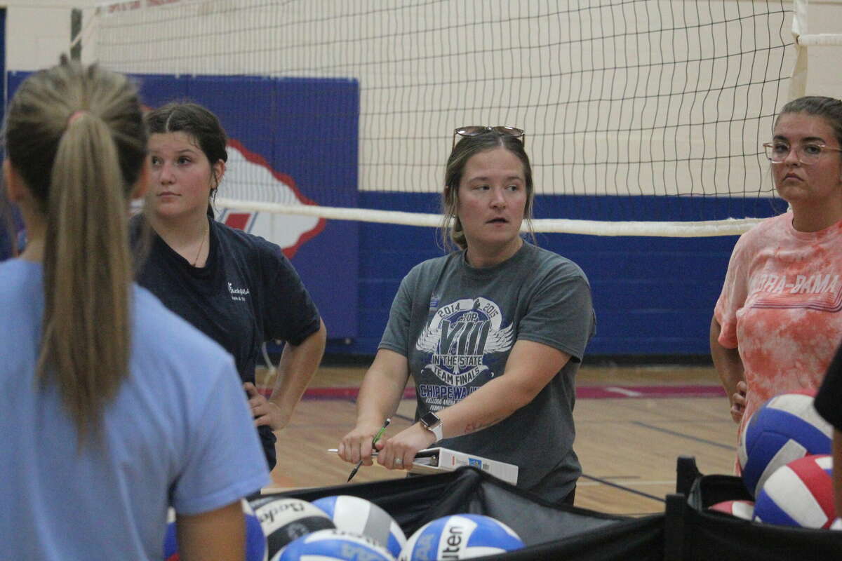 Chippewa Hills volleyball coach Hail Williams talks to her team after a Tuesday practice.