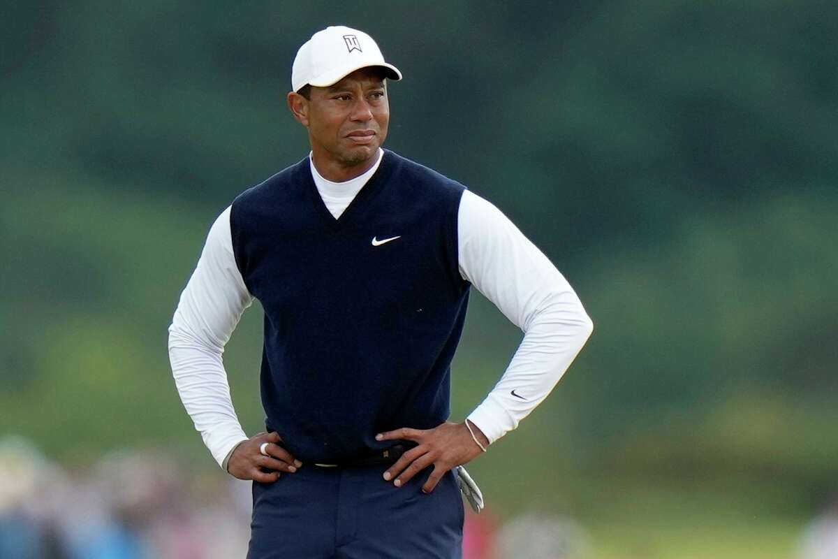 Tiger Woods, seen during the first round of the British Open last month, met with other top PGA players in Delaware to discuss the threat of Saudi-funded LIV Golf, sources said.