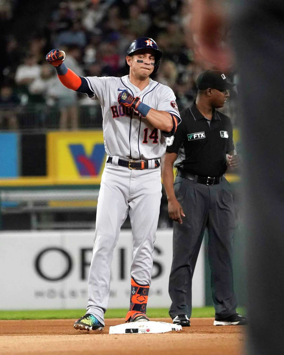 Houston Astros' Mauricio Dubon celebrates his double off Chicago White Sox relief pitcher Jose Ruiz during the sixth inning of a baseball game Tuesday, Aug. 16, 2022, in Chicago. (AP Photo/Charles Rex Arbogast)