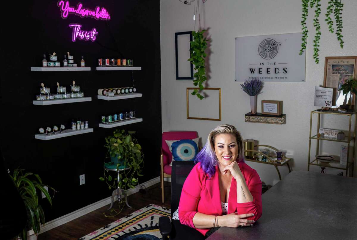 Lika Torline, owner of locally based botanical products company In the Weeds, is pictured in her home, where she runs her business. Her company’s newest product is a glitter deodorant.