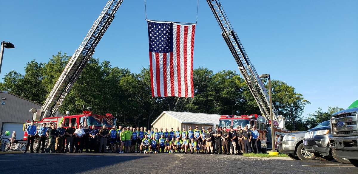 A group of more than two dozen cyclists stopped in Manistee Wednesday morning on their journey to Petoskey for the Thin Blue Shoreline Ride that fundraises and honors Michigan law enforcement officers who have died. 
