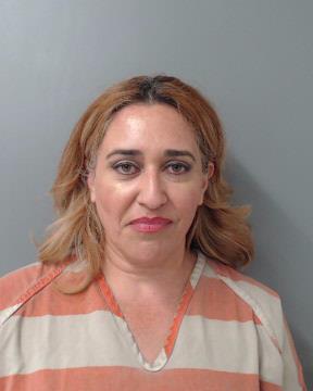 Police: Woman placed tracking device on ex-husband's vehicle. - Vimarsana News